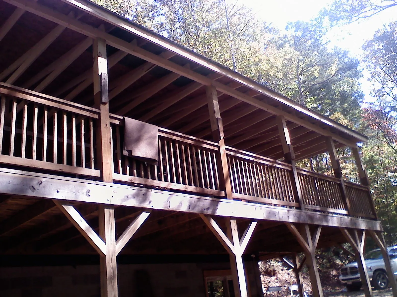 Timber framing under a new elevated porch and deck — Roof Leak Repair in Highlands by Roofing Brothers